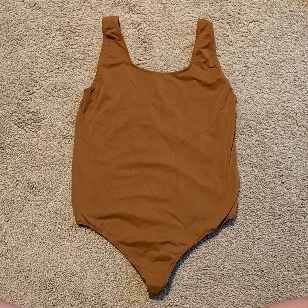 SKIMS Kids Tan One Piece Bodysuit